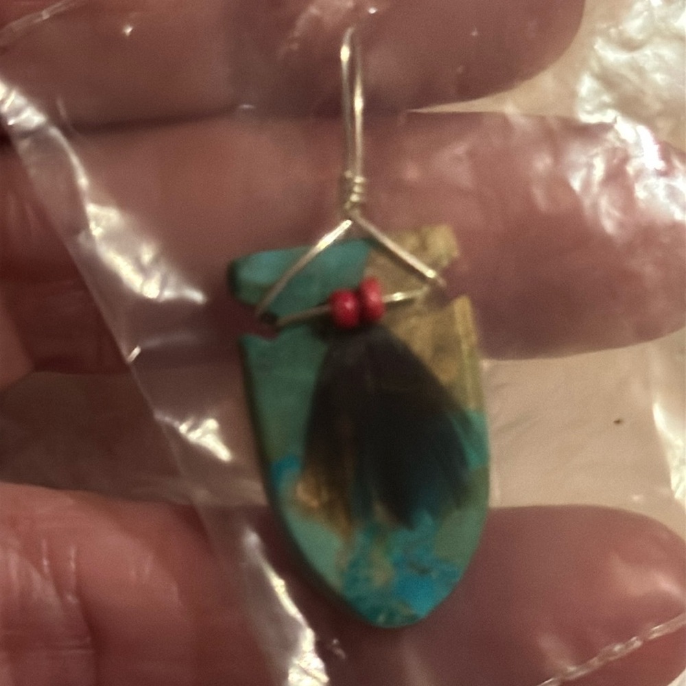 Turquoise necklace wrapped with real beads and feather